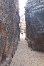 The entrance to Al Beidha contains a small siq (crack in the rock) through which visitors must pass.