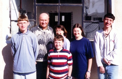 Dan Gibson and his family outside of their home in Abu Lissan (2000-2003) 